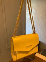 Bolsa crossbody amarela lança perfume Bolsa crossbody amarela lança perfume