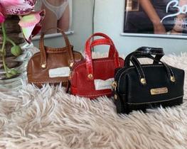 Bolsa de mao com duas formas de uso
