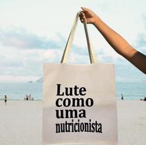 Bolsa ecobag 100% algodão Tema Lute como uma Nutricionista Cor Cru Bolsa ecobag 100% algodão Tema Lute como uma Nutricionista Cor Cru