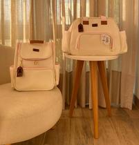 Bolsa ellen com mochila borboleta 5000 - creme lilas Bolsa ellen com mochila borboleta 5000 - creme lilas