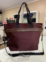 Bolsa em nylon Chalita com duas alças uma de ombro e transversal ótima para ter acompanha