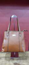 Bolsa femenina marrom delicada