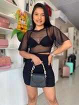 Bolsa festa com duas opções de alça de mão e transversa