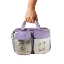 Bolsa Maternidade Lilás com Bordado Praticidade e Charme Bolsa Maternidade Lilás com Bordado Praticidade e Charme