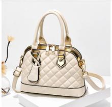 Bolsa nude com chaveiro Bolsa nude com chaveiro