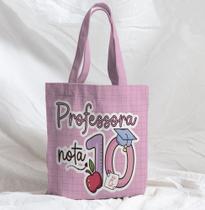 Bolsa Sacola Artesanal de Tecido Professora Nota 10 Linhas e Fundo Rosa Bolsa Sacola Artesanal de Tecido Professora Nota 10 Linhas e Fundo Rosa