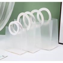 Bolsa Transparente com Alça Reforçada Redonda para Kits e Presentes - 12 Unidades Bolsa Transparente com Alça Reforçada Redonda para Kits e Presentes - 12 Unidades
