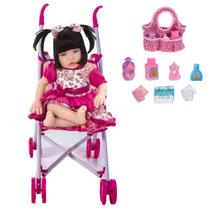 Boneca Baby Kiss Estilo Reborn Morena 910 + Carrinho e Bolsa