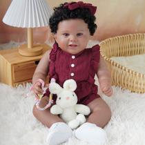 Boneca Bebê Reborn Brastoy Realista Silicone 55cm Conjunto de Roupa Chupeta Mamadeira e Pelúcia Pode Dar Banho Roupa