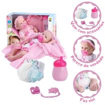 Boneca Bebê Reborn Faz Xixi C/ Mamadeira E Chupeta