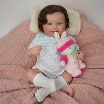 Boneca Bebê Reborn Realista Brastoy Silicone Pode Dar Banho Conjunto de Roupa Chupeta Mamadeira e Pelúcia