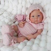 Boneca Bebê Reborn Realista Silicone Sólido 35cm Com Kit Conjunto de Roupa Chupeta Mamadeira e Pelúcia Pode Tomar Banho