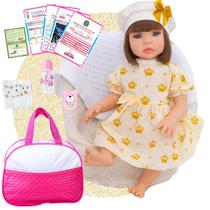 Boneca Bebê Reborn Realista Silicone Vestido Dourado Bolsa de Maternidade