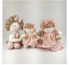 Boneca de pano em quadro