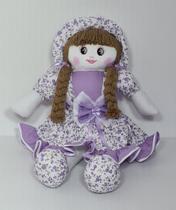 Boneca De Pano Tamara Pelúcia Tecido Lilás Floral 56cm Boneca De Pano Tamara Pelúcia Tecido Lilás Floral 56cm