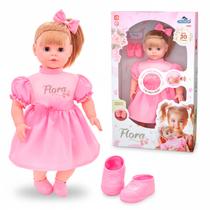 Boneca Flora Fala 30 Frases Com Olhos Moveis Sapatinho Rosa E Lacinho 50 cm Boneca Flora Fala 30 Frases Com Olhos Moveis Sapatinho Rosa E Lacinho 50 cm