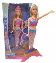 Boneca Sereia Musical com acessorios - calda brilhante - 28cm de altura Boneca Sereia Musical com acessorios - calda brilhante - 28cm de altura