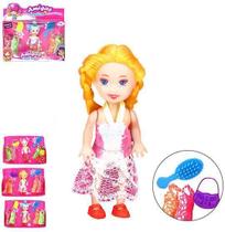 Boneca Troca Vestido De Tecido Com Bolsa + Escova 7 Pecas