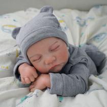 Boneco Bebê Reborn Brastoy Realista Silicone 48cm Conjunto de Roupa Chupeta Mamadeira e Pelúcia Pode Dar Banho Roupa