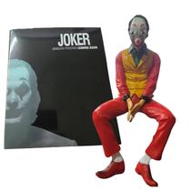 Boneco Coringa 16cm sentado com mascara