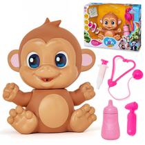 Boneco Macaco My Fun Tears Zoo Em Vinil Que Mama E Chora Com Mamadeira E Kit Médico