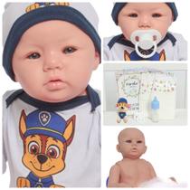 Boneco Reborn Masculino De Silicone Com Kit Pelúcia E Itens