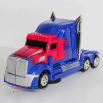 Boneco Transformers Optimus Prime Caminhão A Pilha Bateria