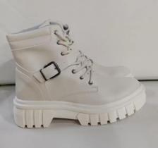 Bota feminina Felina couturno