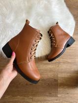 Bota feminina tratorada tendencia inverno 2025/2026 Bota feminina tratorada tendencia inverno 2025/2026