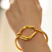 Bracelete Articulado com detalhe oval em orgânico folheado em ouro ( serve até pulso 19 cm)