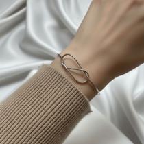 Bracelete em Aço Inox Infinito Bracelete em Aço Inox Infinito
