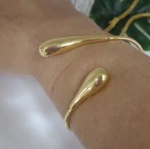 Bracelete "gotas". Peça banhada a ouro, detalhe gotas nas pontas.
