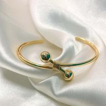 Bracelete liso detalhe 2 esferas banhado a ouro 18k