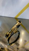 Bracelete Preto com dourado