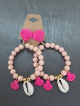 Brinco modelo com conchas