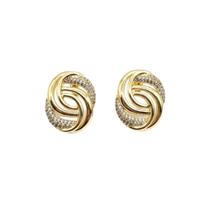 Brinco Nó com Micro Zircônia Cristal Banhado a Ouro Brinco Nó com Micro Zircônia Cristal Banhado a Ouro