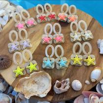 Brincos praianos Brincos praianos