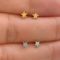 Brincos titânio estrela dourada com fecho de tarracha
