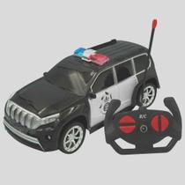 Brinquedo Carrinho Caminhonete de Controle Remoto e uma caminhonete Polícia Blazer 22,5cm