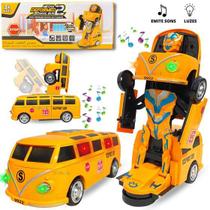 Brinquedo Carrinho Transformers Vira Robô Kombi Escolar Bate Volta Som E Luz - Toy King