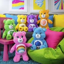 Brinquedo de pelúcia Care Bears Funshine Bear 18 cm com emblema Glitter Belly