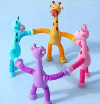Brinquedo girafa com led e ventosa infantil