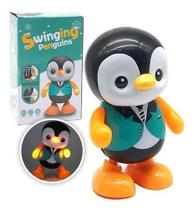 Brinquedo Infantil Boneco Pinguim Dançarino Com Som E Luz