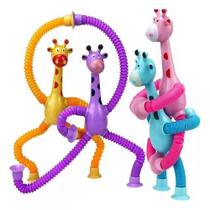 Brinquedo Infantil Girafinha Pop Tube Anti Estresse Com Ventosa E Luz