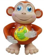 Brinquedo Macaco Divertido Musical Dançante Com Luzes..