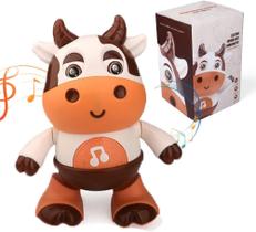 Brinquedo musical MOVVIYE Baby Cow Dancing Walking com música e luz