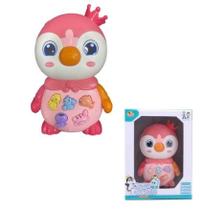 Brinquedo pinguim com teclado musical