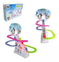 Brinquedo Pista Elevador Com Som E Luz Pinguins Fofinhos
