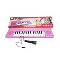 Brinquedo Teclado Piano Infantil Com Microfone Rosa