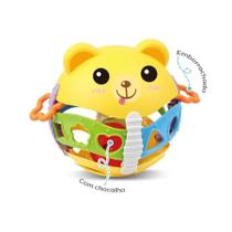 Brinquedo Ursinho Roly Poly Pimpi Colorido Balança e Volta com Chocalho